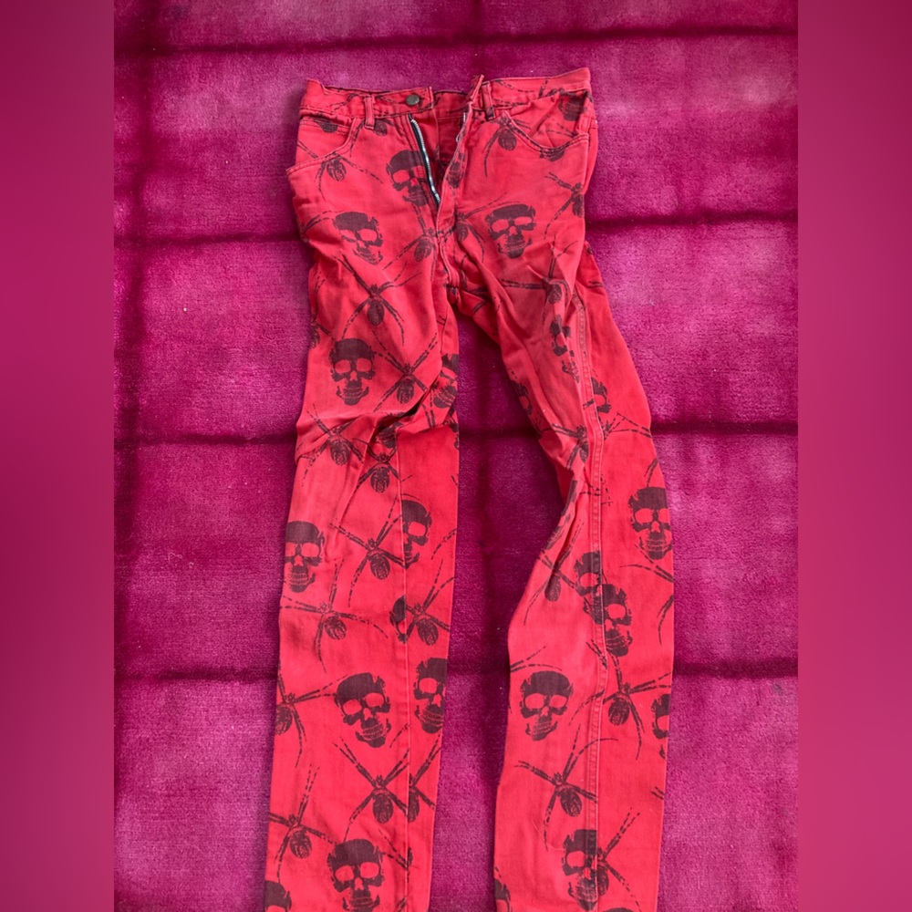 Edgy red spider jeans